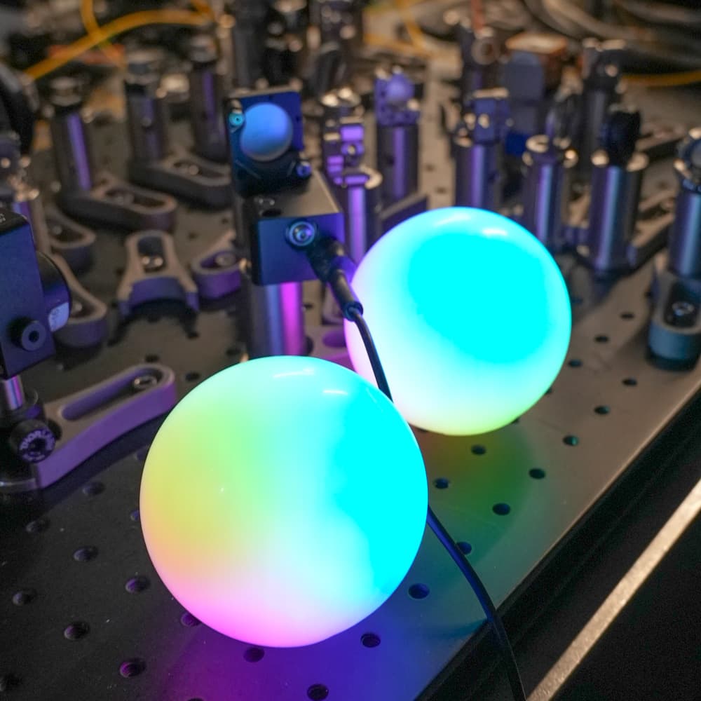A quantum computer's gold-plated chandelier of microwave cabling, mounted inside a dilution refrigerator