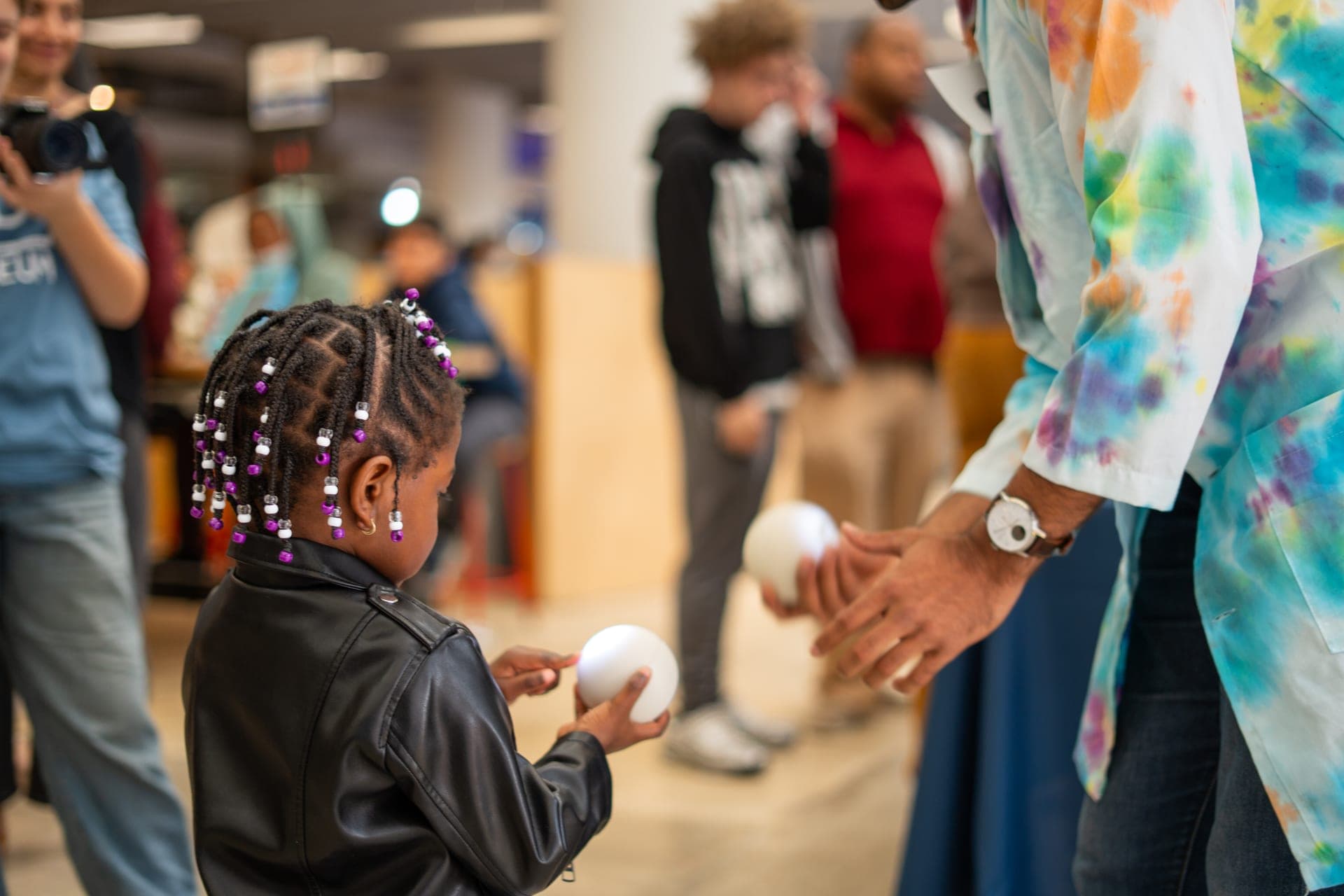 Young child receiving a Qubi