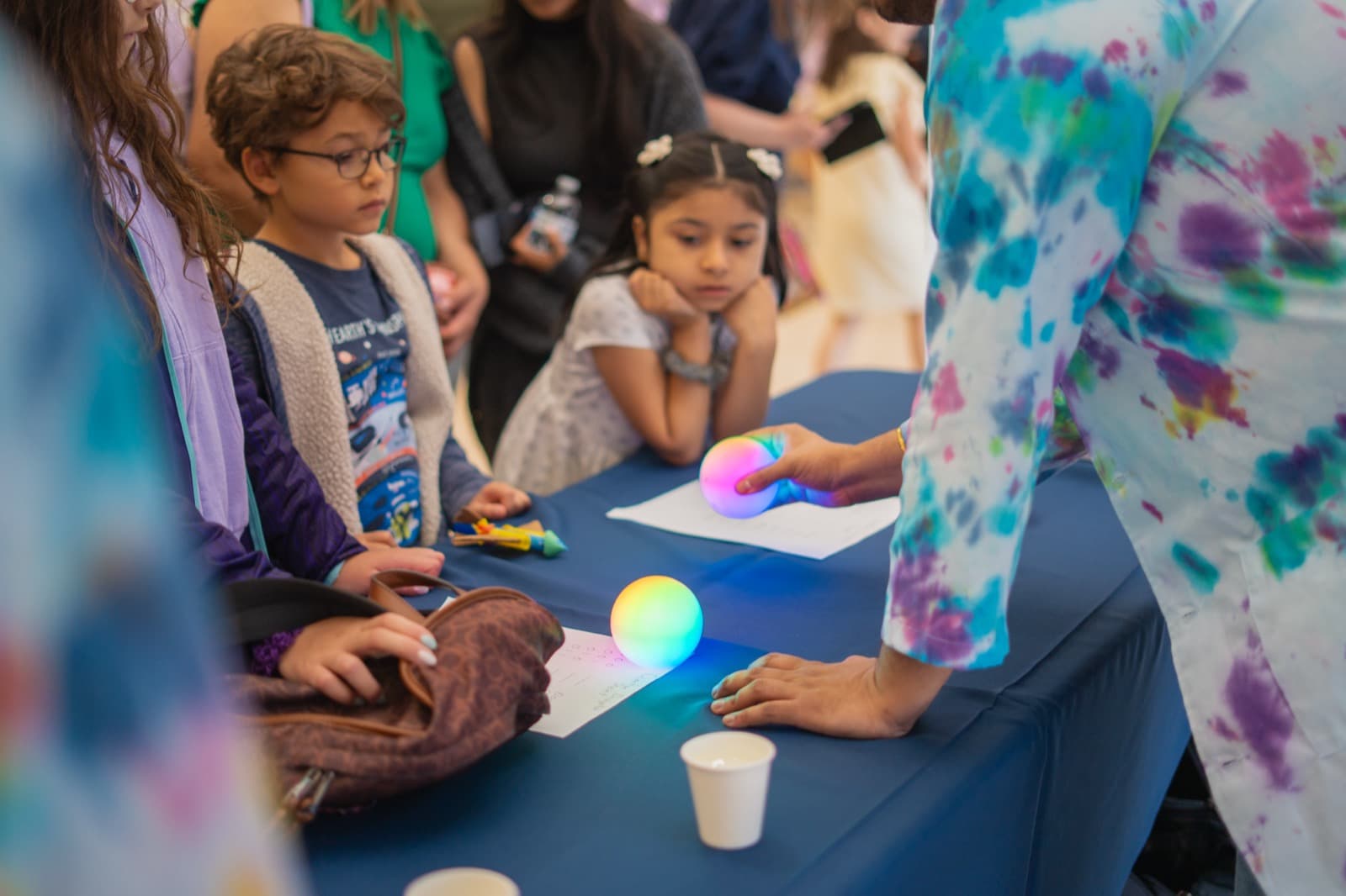 A child exploring Qubi at a science expo